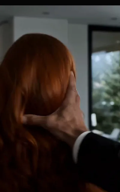 The crown of her head — his hands cradling her hair, foreheads almost meeting, the marriage quietly turning real (ep5; romantic-closeness frame as aired, not amplified)