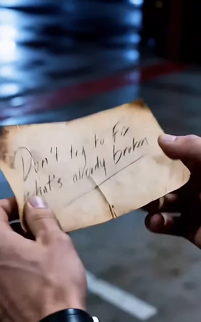 "Don’t try to fix what’s already broken" — the burned note held in two hands, the crash’s paper trail (ep2, burned note prop, shown as aired)