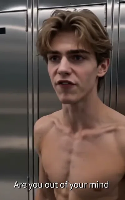 The locker-room challenge — a slim light golden-brown-curled young man shirtless between rows of grey metal lockers, brows raised in disbelief, lips parted mid-question, gaze angled left, the caption Are you out of your mind beneath (ep3; subtitles as aired)