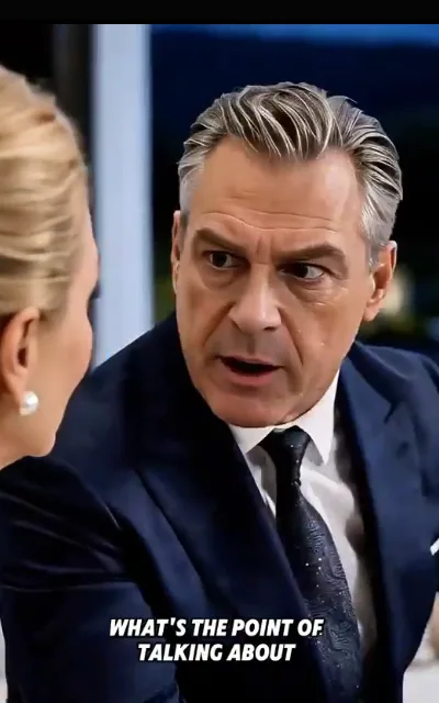 The drawing-room rebuke — a silver-backed man in a navy suit gesturing mid-reproach at a pearl-eared blonde across the formal interior, the caption “WHAT'S THE POINT OF TALKING ABOUT” beneath (ep1; subtitles as aired — arranged-marriage negotiation context, dialogue conflict only)