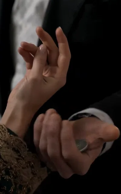 Hands, close — the grown-up thread of the story kept firmly in its own frame (ep3)