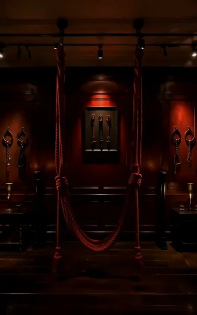 Episode 2 frame: the Alpha's presence dominates the room — power, scent, and possession