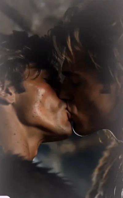 The rain-soaked kiss between the two male leads in the modern timeline — the opening frame that defines the central pairing