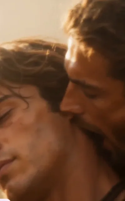 The two leads close together, the tension held in one quiet frame