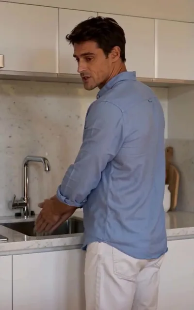 Frame ep02-f02 from episode 2 — Jack at the sink (ep2; subtitles as aired — Go upstairs and study)