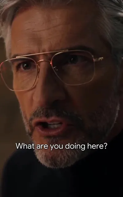 Frame ep02-f00 from episode 2 — The Director's face (ep2; subtitles as aired — What are you doing here)