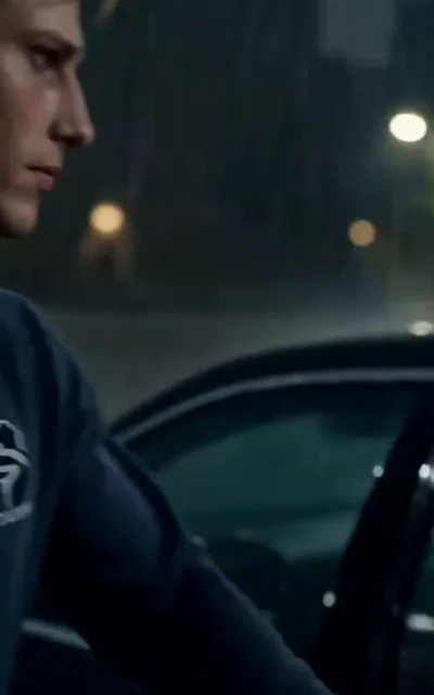 Frame ep01-f03 from episode 1 — Mason steadies Caleb in the car (ep1; subtitles as aired — It's okay, Caleb. Let's go home.)
