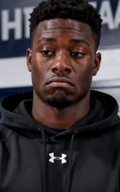 Frame ep02-f02 from episode 2 — Deshawn on the bench watching the two of them (ep2; subtitles as aired — He just grabbed him by the waist, didn't push him away, held him steady.)