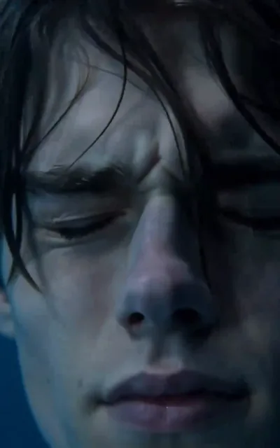 Frame ep01-f03 from episode 1 — Caleb underwater, the rescue (ep1; subtitles as aired — I can't let him die, not here, not now. Hold on, just hold on.)
