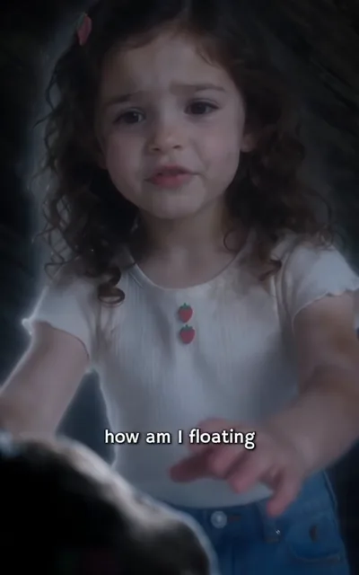 Frame ep04-f00 from episode 4 — Mila's spirit floating above the floor (ep4; subtitles as aired — I, how am I floating?)
