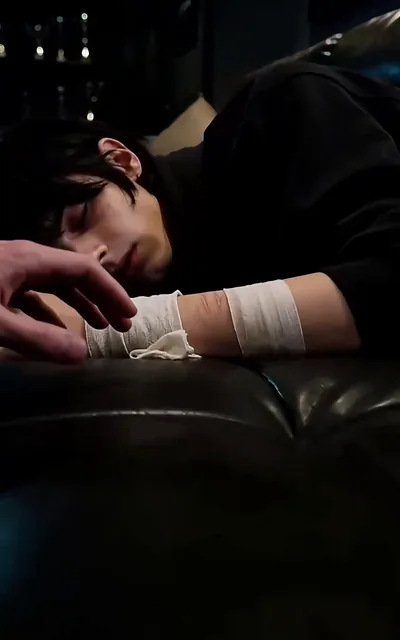 Frame ep03-f00 from episode 3 — Noah's bandaged arm resting on Adrian (ep3; subtitles as aired — You were watching me for four years.)