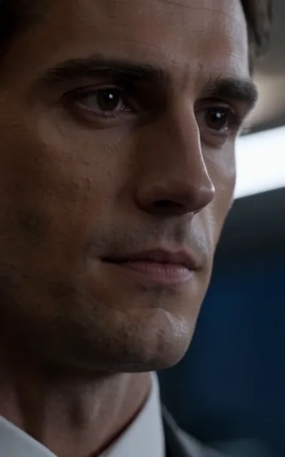 Frame ep01-f02 from episode 1 — Alexander's close-up across the boardroom (ep1; subtitles as aired — She needed a neutral-looking pawn to push me out. You're that pawn.)