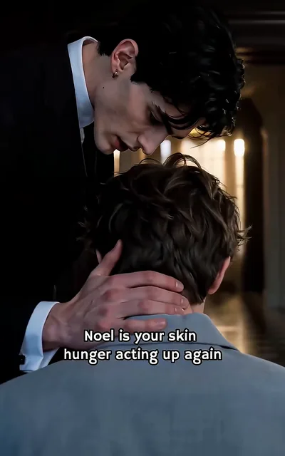 Frame ep01-f00 from episode 1 — Adrian holds Noel's jaw in the dark hallway (ep1; subtitles as aired — Noel, is your skin hunger acting up again?)