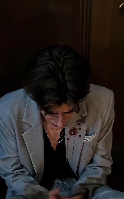 Frame ep01-f02 from episode 1 — Noel blocks the door (ep1; subtitles as aired — Because you've touched me, so you can't touch anyone else.)