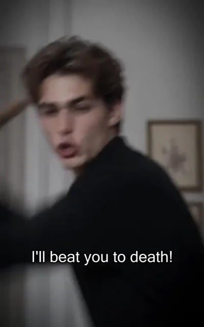 Frame ep01-f02 from episode 1 — Ethan shouts in the doorway (ep1; subtitles as aired — I'll beat you to death!)