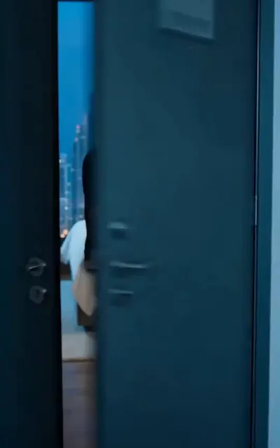 Frame ep01-f00 from episode 1 — The door to the hotel room (ep1; subtitles as aired — Three years and all I get is a sticky note.)