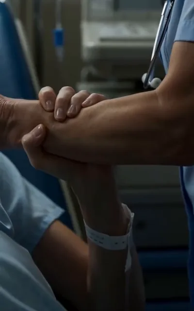 Frame ep01-f01 from episode 1 — Hands gripping an arm in the hospital (ep1; subtitles as aired — Someone set the building on fire.)