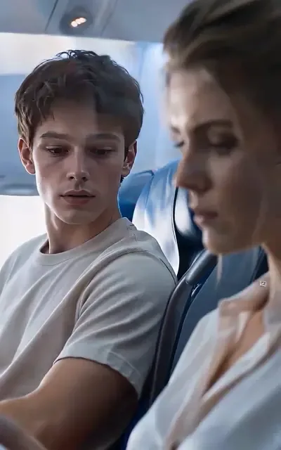 Frame ep01-f02 from episode 1 — The plane hits turbulence (ep1; subtitles as aired — Something's wrong with the plane. Everyone, hold on to your armrest.)