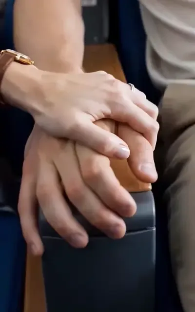 Frame ep01-f03 from episode 1 — Noah watches her panic (ep1; subtitles as aired — Her hand is so cold. I wish time could slow down.)