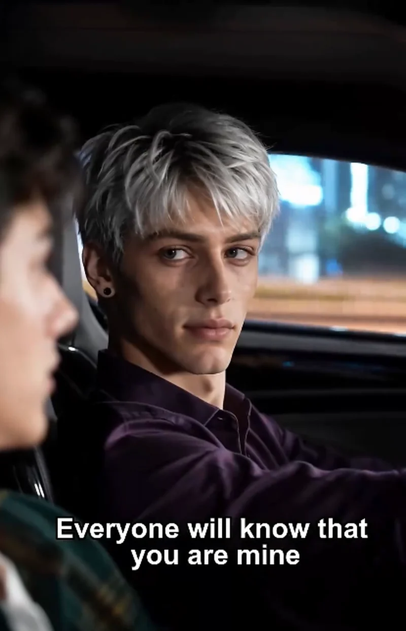 Dylan (silver hair, dark shirt) in the driver's seat of a black coupe at night, hands on the steering wheel, looking toward Ethan in the passenger seat, subtitle reads 