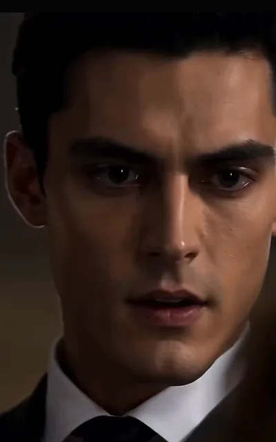 A stunned close-up of Kieran, the fury draining into something heavier — the first beat of the regret arc (ep5)