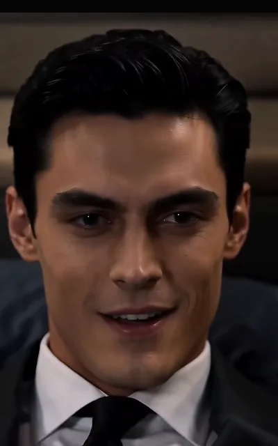 Kieran slicked-back and suited, a smirk with no warmth behind it — the elite heir at his most untouchable (ep5)