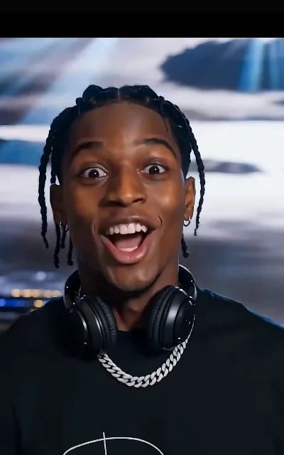 The reaction shot — the station’s own wide-eyed surprise gag running under the scene (ep6; meme insert as aired, not amplified — station treatment kept exactly as shown, never named)