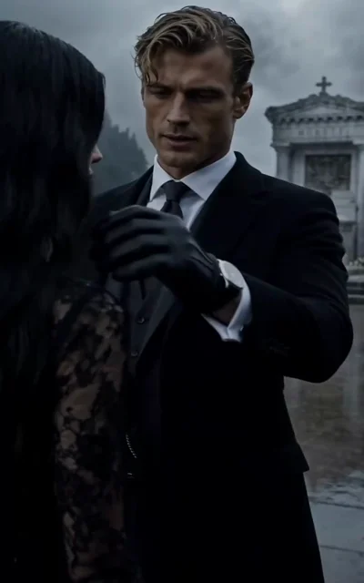 Episode 1 frame: a blonde man in a black suit adjusts Bella's veil at the graveside — the uncle's first gesture of possession