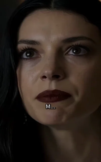 Episode 4 frame: extreme close-up of Bella's tearful eyes as she whispers — 'M...' — the moment a terrible truth begins to surface