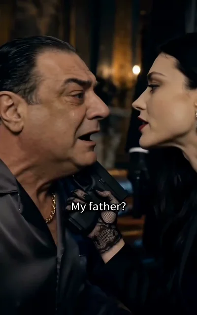Episode 5 frame: Bella grabs the mafia boss by the collar, demanding — 'My father?' — the accusation that shatters the wedding night