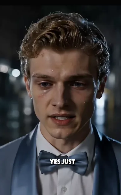 "YES JUST" — Eli tear-streaked with a scrape on his right cheekbone, the line cut off mid-sentence as aired (no completion supplied); the mark of the night left on his face, staged exactly as shot (ep5, subtitles as aired; scar-implied frame as aired, not amplified)