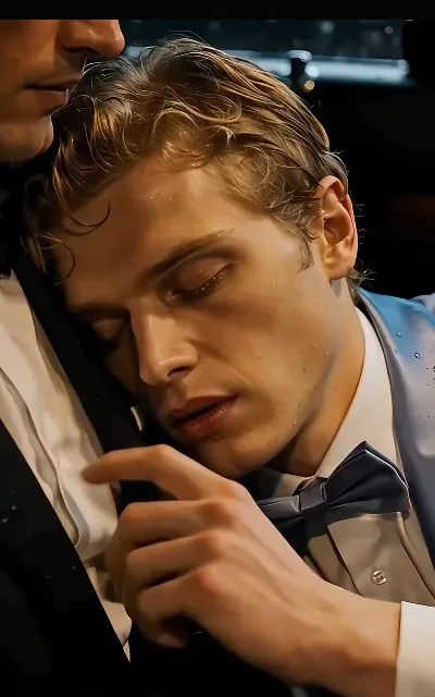 The back seat after the rain: Eli leaning against Kalen’s shoulder, a fist closed on his shirt front — the first thaw of the winning-back arc (ep5)