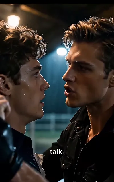 "talk." — the curly-haired stable hand in tears facing a black-jacketed cowboy who wants answers: the two leads' first real standoff (ep1, subtitles as aired)