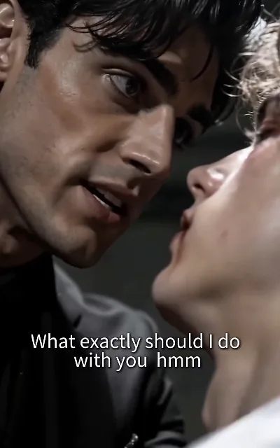 "What exactly should I do with you hmm" — the disposal question delivered at whisper range, a gloved hand guiding Evan's jaw: the dangerous pull of the cat-and-mouse (ep1, subtitles as aired; intimate-tension frame as aired, no explicit content)