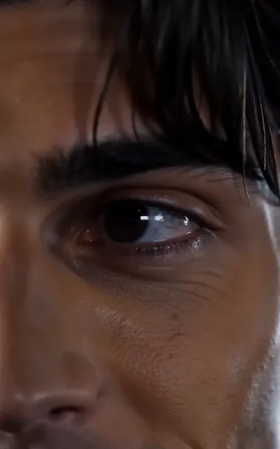 A close-up on Evan's eyes, brimming — the moment the cover starts costing more than it pays (ep5)