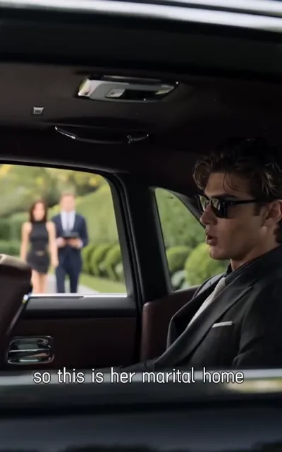The arrival — from the back seat of a luxury sedan, a young man with chestnut curls and pale highlights, dark-framed sunglasses and a grey suit with pocket square watching through the window as a woman in a black sleeveless dress and a man in a navy suit stand on the manicured walk of a grand residence, the caption so this is her marital home beneath (ep2; subtitles as aired — the male lead's true-form arrival, luxury-car line)