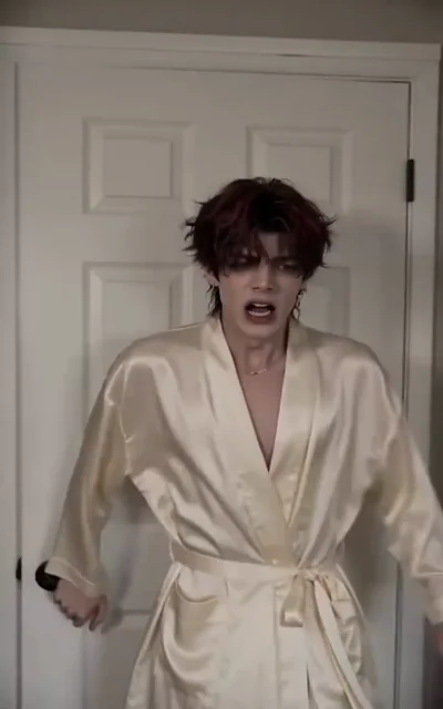 Episode 4 frame: The mysterious stranger with glasses stands his ground, his cool demeanor masking deeper intentions