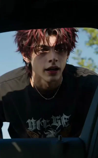 Episode 4 frame: Lane with distinctive red-black hair streak, caught between his past and the curse's transformation